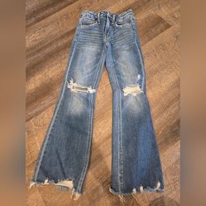 Distressed Blue Jeans